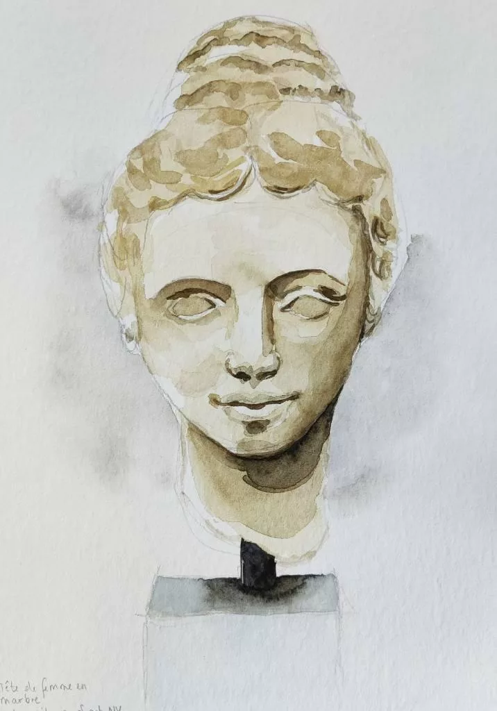 Dessin représentant une tête sculptée de femme, de face, sur un support