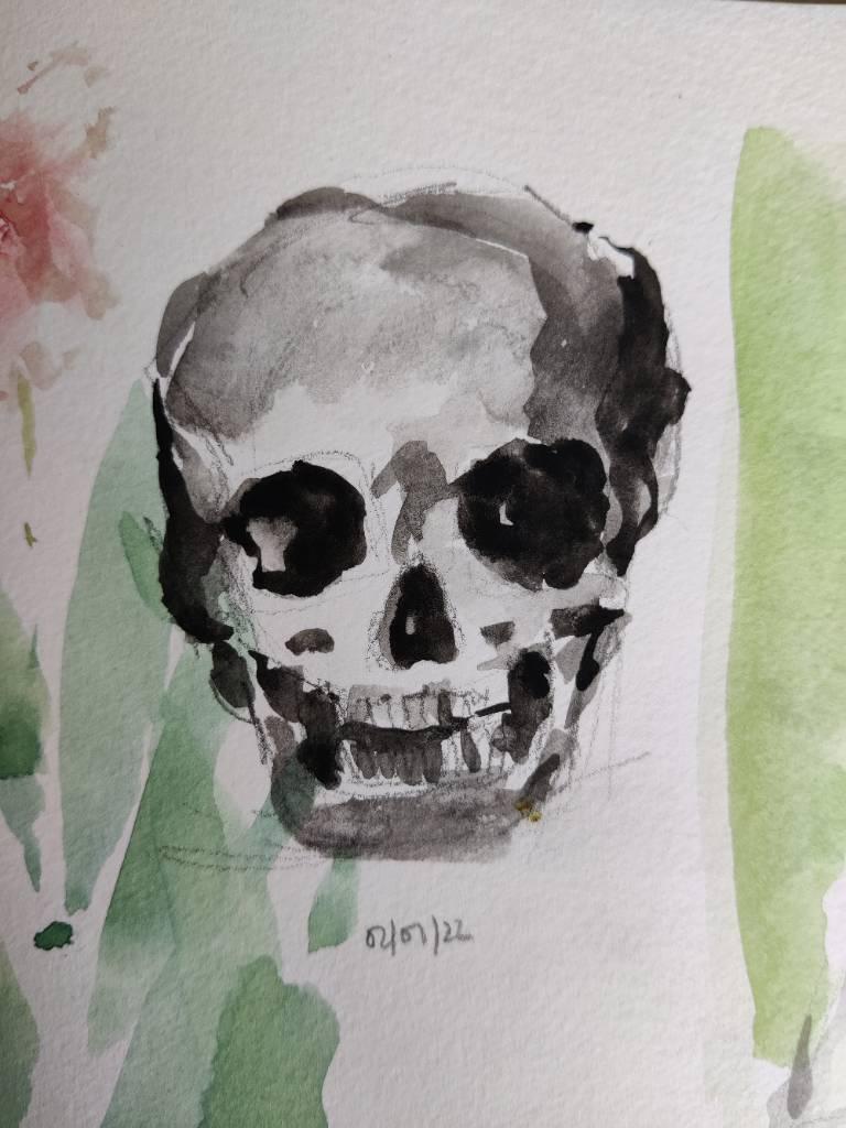 Peinture, vite faite, d'une tête de mort en noir et nuances de gris