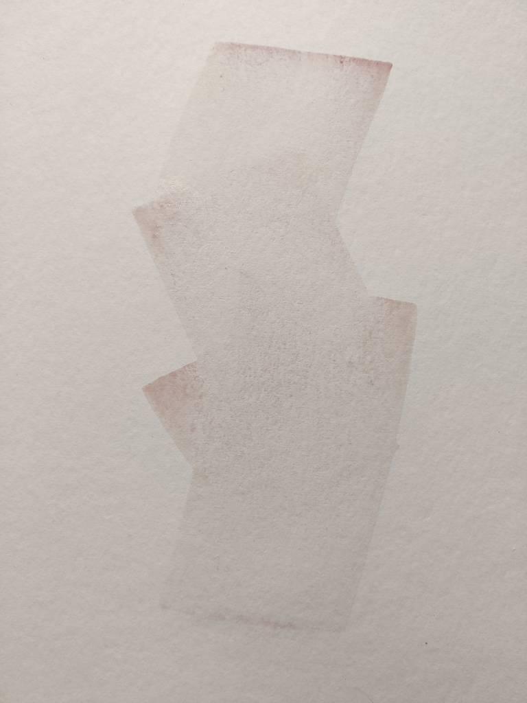 Trois traits de peinture d'un rose très clair et transparent