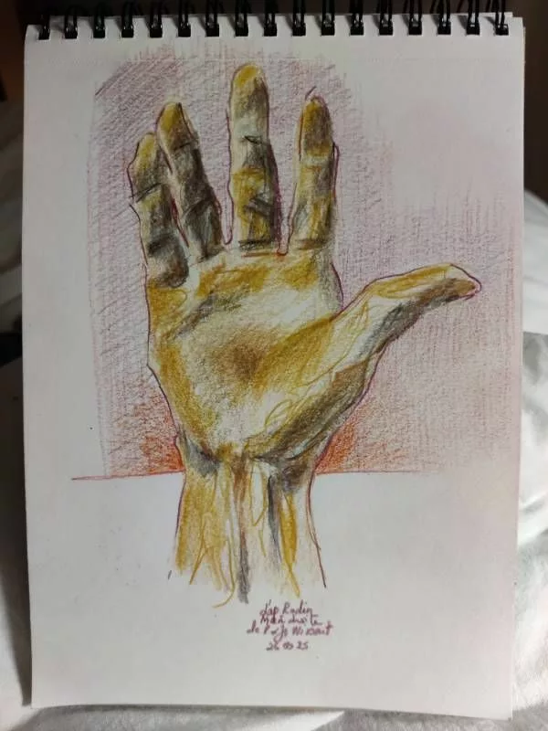 Croquis aux crayons de couleur représentant une main ouverte