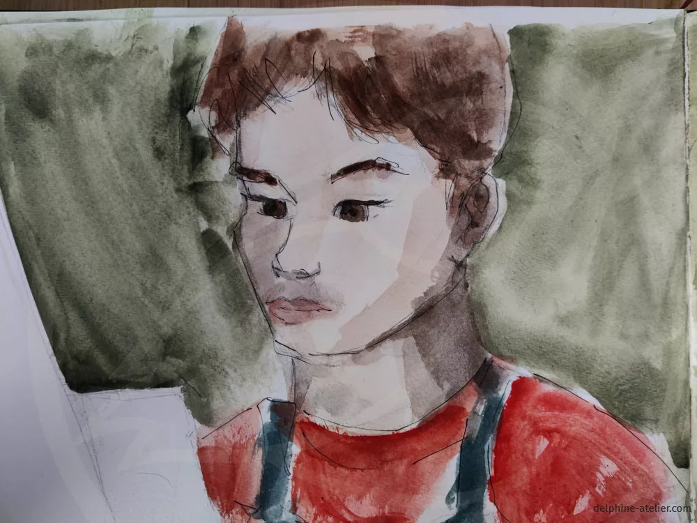 Garçon en train de peindre