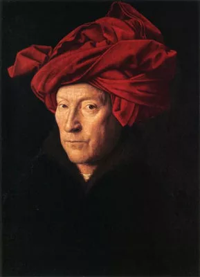 Portrait d'un visage se détachant d'un fond noir avec un gros turban rouge sur la tête