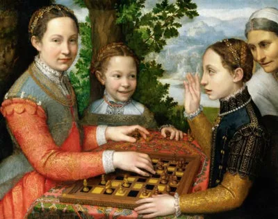Groupe de trois jeunes filles et une femme devant un jeu d'échec