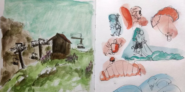 Une double page d'un carnet de voyage (rognée en bas) avec à gauche un paysage de montagne à l'aquarelle et à droite des croquis de parapentistes