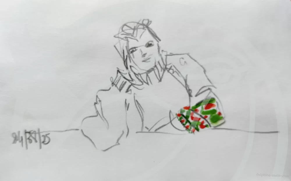 Une personne appuyée sur son coud sur une table au crayon. Seul le motif du pull est fait en couleurs