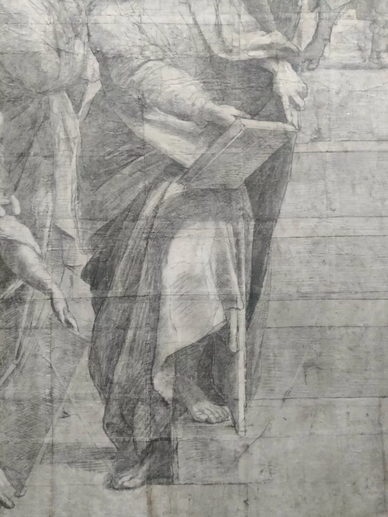 Dessin d'un drapé sur un homme en train de tenir un livre