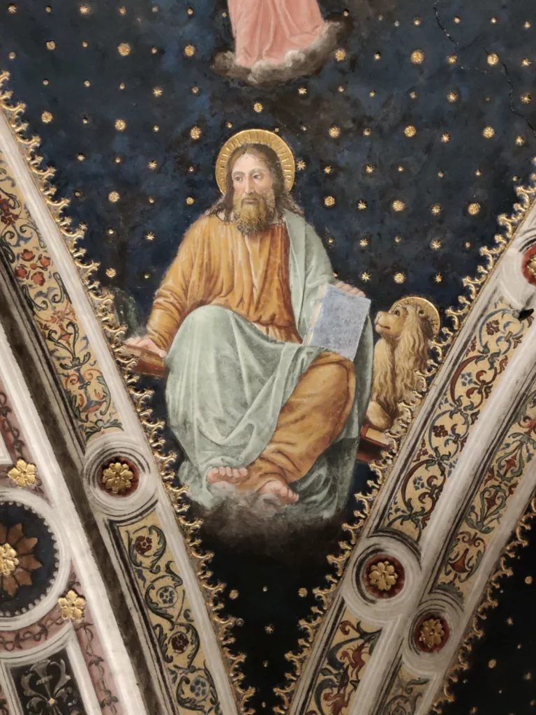 Fresque d'un homme auréolé avec un lion