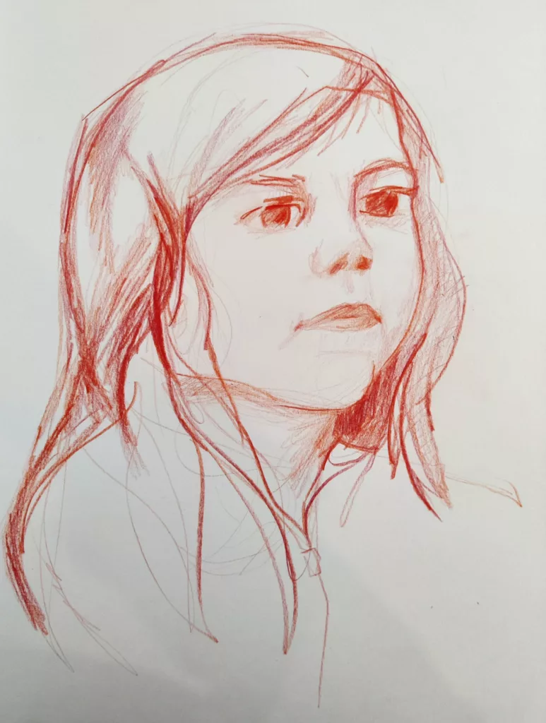 Portrait d'une jeune fille au crayon de couleur rouge