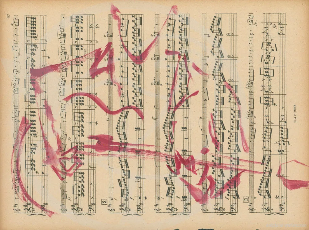 Guitariste rose sur partition