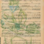 Dessin aux crayons de couleurs d'un guitariste sur papier de partition