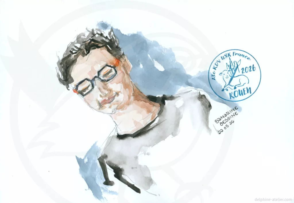 Croquis au crayon et à l'aquarelle d'une personne souriante, yeux fermés. Une inscription ("Sandrine dessine, 22 05 26") et un tampon "13e RDV USK France 2026 Rouen"